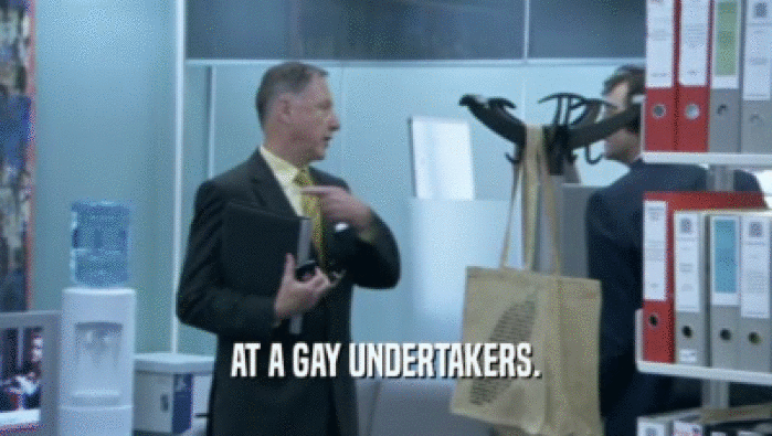 AT A GAY UNDERTAKERS.  