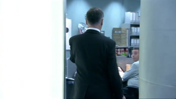 SECRETARY OF STATE WANTS TO DO THE INTERVIEW IN FRONT OF THE SIGN 