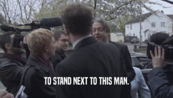 TO STAND NEXT TO THIS MAN.  
