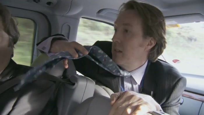 WHAT'S ON YOUR TIE? TINTIN MOON ROCKETS. OH, FOR FUCK'S SAKE. 