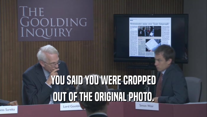 YOU SAID YOU WERE CROPPED OUT OF THE ORIGINAL PHOTO. 
