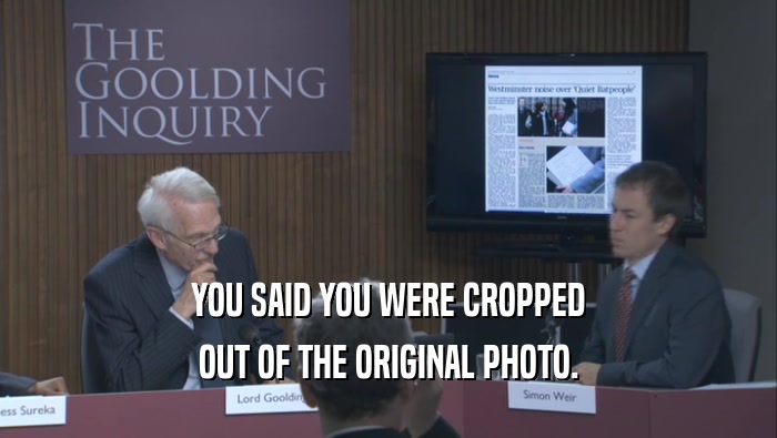 YOU SAID YOU WERE CROPPED OUT OF THE ORIGINAL PHOTO. 