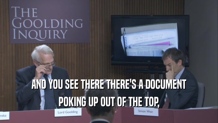 AND YOU SEE THERE THERE'S A DOCUMENT POKING UP OUT OF THE TOP, 