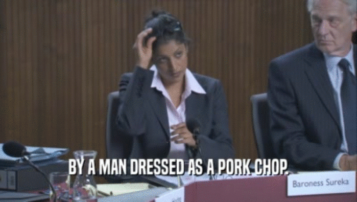 BY A MAN DRESSED AS A PORK CHOP.  